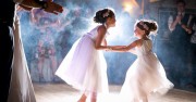 Children dance at a Timber House Resort wedding celebration.