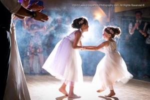 Children dance at a Timber House Resort wedding celebration.