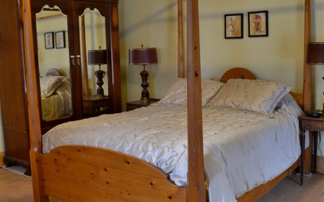 Large ground floor queen room with heated bathroom floor.