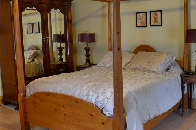 Large ground floor queen room with heated bathroom floor.
