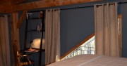 Spacious and comfortable, with a cathedral ceiling, overlooking woodlands.