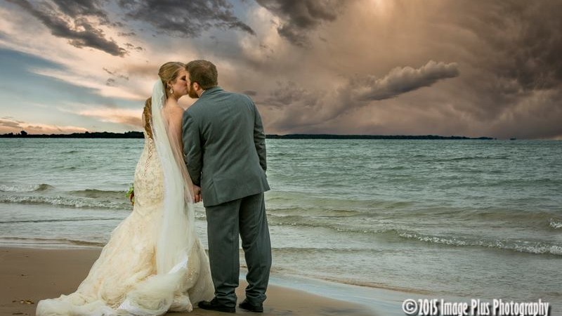 Launching a new life together, from the beach at the Timber House Resort.
